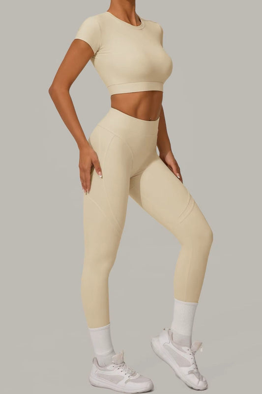 Cream Beige women's activewear, pilates, gym and yoga set with high-waisted leggings and fitted crop top.