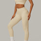 Cream Beige women's activewear, pilates, gym and yoga set with high-waisted leggings and fitted crop top.