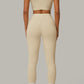 Cream Beige women's activewear, pilates, gym and yoga set with high-waisted leggings and fitted crop top.